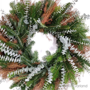 Fresh Cut Evergreens with Baby Eucalyptus and Cryptomeria make up this EverRing Wreath